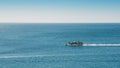 Fishing boat returning to home harbor, Portugal Royalty Free Stock Photo