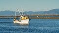 A fishing boat returning to Port Motueka