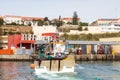 Fishing boat returns home in Sines, Portugal Royalty Free Stock Photo