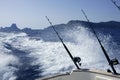 Fishing boat with rod and reels in mediterranean