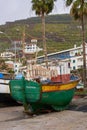 Fishing boat Sa Carneiro with codfish drying, Portugal Royalty Free Stock Photo