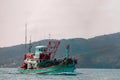 A fishing boat sailed by sea