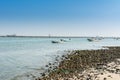 Fishing boat sailing at the sea in the corniche park, the city of Dammam, Kingdom of Saudi Arabia Royalty Free Stock Photo