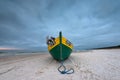 Fishing boat on sandy beach