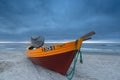 Fishing boat on sandy beach