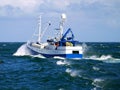 Fishing Boat Underway at Sea. Royalty Free Stock Photo