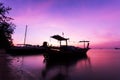 Fishing boat in the sea in morning time with scenery beautiful s Royalty Free Stock Photo