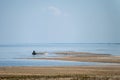 Fishing boat on the shore of the Baltic Sea, Latvia Royalty Free Stock Photo