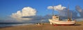 Fishing boat on the shore of the Jammerbugten, Denmark. Royalty Free Stock Photo