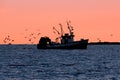 Fishing boat in silhouette