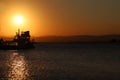 Fishing boat silhouette at sunset Royalty Free Stock Photo