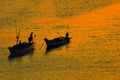 Fishing boat silhouettes