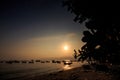 Fishing Boat Silhouettes at Sunset in Sea by Beach in Vietnam Royalty Free Stock Photo