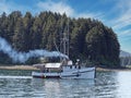 Fishing boat in Southeast Alaska with blue sky Royalty Free Stock Photo
