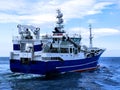 Fishing Boat Underway to Sea Royalty Free Stock Photo