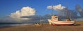 Fishing boat and summer clouds Royalty Free Stock Photo