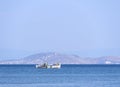 Fishing boat on a sunny afternoon on the calm Aegean Sea on the island of Evia, Greece