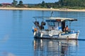 Fishing boat at sunny morning in front of Destenika beach