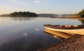 Fishing boat at sunrise, lough key lake, ireland Royalty Free Stock Photo