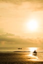 Fishing boat sunrise with motorcycle Royalty Free Stock Photo