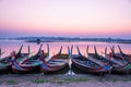 Fishing boat in sunrise at U Bein bridge, Mandalay, Myanmar Royalty Free Stock Photo