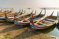 Fishing boat in sunrise at U Bein bridge, Mandalay, Myanmar Royalty Free Stock Photo