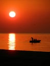 Fishing boat at sunset Royalty Free Stock Photo
