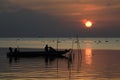 The fishing boat in the sunset