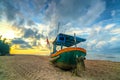 Fishing boat to dawn on the beautiful beach Royalty Free Stock Photo