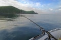 Fishing boat trolling in ocean