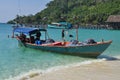 Fishing boat on a tropical beach, Koh Rong, Cambodia Royalty Free Stock Photo