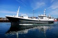 Fishing Boat Manoeuvring in Port Royalty Free Stock Photo