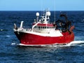 Fishing Boat Underway at Sea. Royalty Free Stock Photo