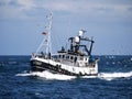 Fishing Boat Underway at Sea. Royalty Free Stock Photo