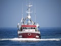 Fishing Boat Underway at Speed Royalty Free Stock Photo