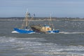 Fishing boat on the Wadden Sea near the island Ameland