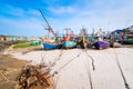 Fishing boats aground on the beach over cloudy sky at Prachuap K Royalty Free Stock Photo