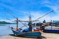 Fishing boats aground on the beach over cloudy sky at Prachuap K Royalty Free Stock Photo