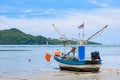 Fishing boats aground on the beach over cloudy sky at Prachuap K Royalty Free Stock Photo