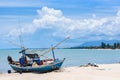Fishing boats aground on the beach over cloudy sky at Prachuap K Royalty Free Stock Photo