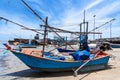 Fishing boats aground on the beach over cloudy sky at Prachuap K Royalty Free Stock Photo