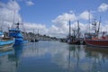 Fishing boats at anchor in marina in Yaquina Bay