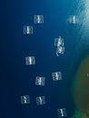 Fishing boats are at anchor in ocean on Sumbawa. Aerial view Royalty Free Stock Photo