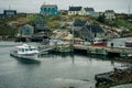 Fishing boats anchored and waiting in a secluded bay in Peggy's Cove, Nova Scotia, Canada - oct 2022 Royalty Free Stock Photo