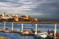 Fishing boats in the bay of the Pacific Ocean (Morocco, Sali), against the background of the old fortress