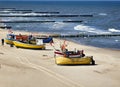 Fishing boats on the beach of the Baltic Sea near KoÃâobrzeg, Poland Royalty Free Stock Photo