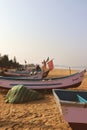 Fishing boats on the beach in Goa, India. Goa is one of the most popular tourist destinations in India. Royalty Free Stock Photo