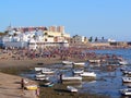 Fishing boats on the beach of La Caleta in the bay of the capital of Cadiz, Andalusia. Spain.