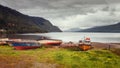 Fishing boats on the beach of Puyuhuapi Fjord, Patagonia, Chile, Pacific Ocean Royalty Free Stock Photo