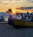 Fishing boats on the beach at sunset: Baltic Sea, Western Pomerania, Poland, Europe Royalty Free Stock Photo